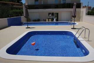 Гостевой дом Zigovic Apartmani Бар Семейный номер с террасой-1